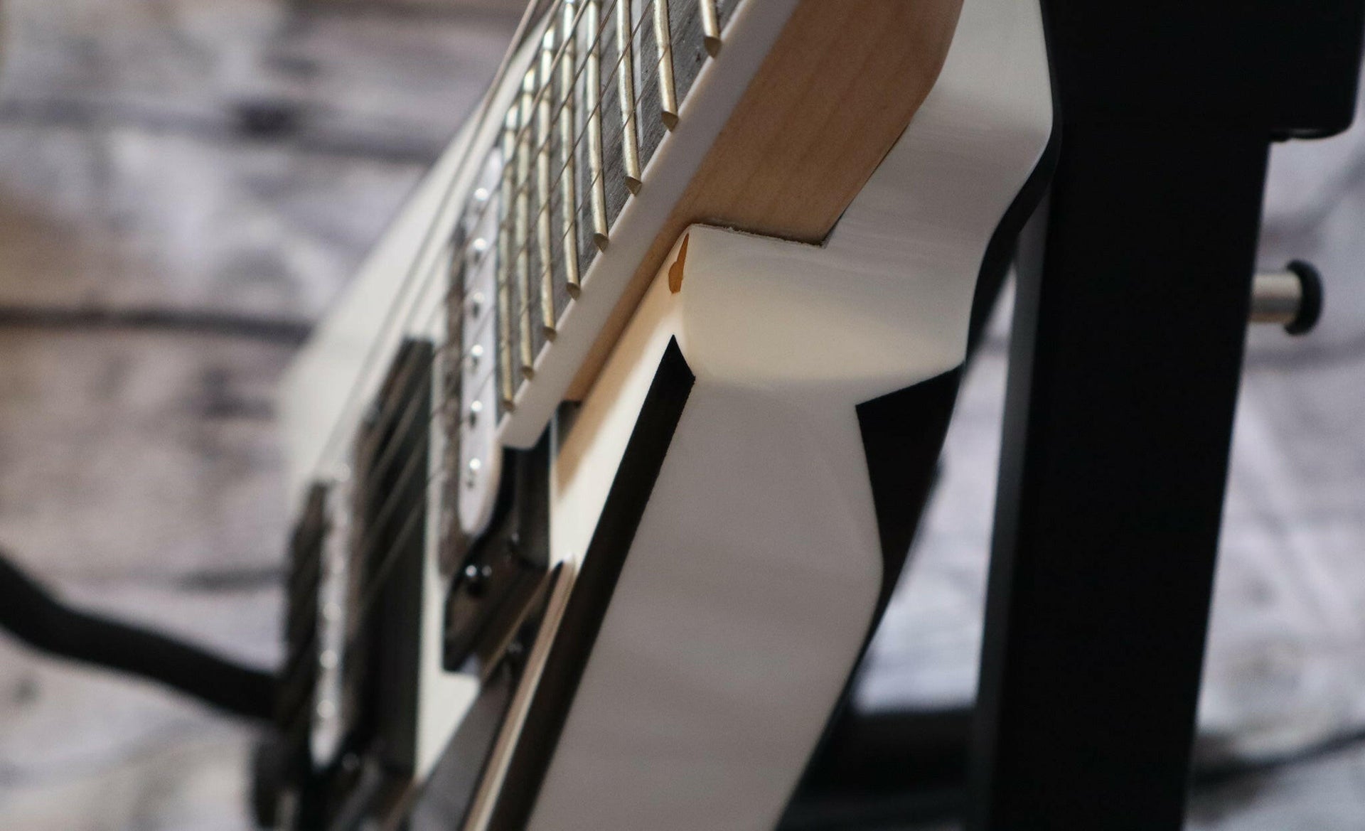 Jackson JS32T Rhoads electric guitar-white w/black bevels.